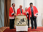 AUA Secretary, Dr. Manoj Monga, and leaders from the Japanese Urological Association open a barrel of saki during the JUA Annual Meeting.