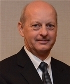 Headshot of John D. Denstedt, MD