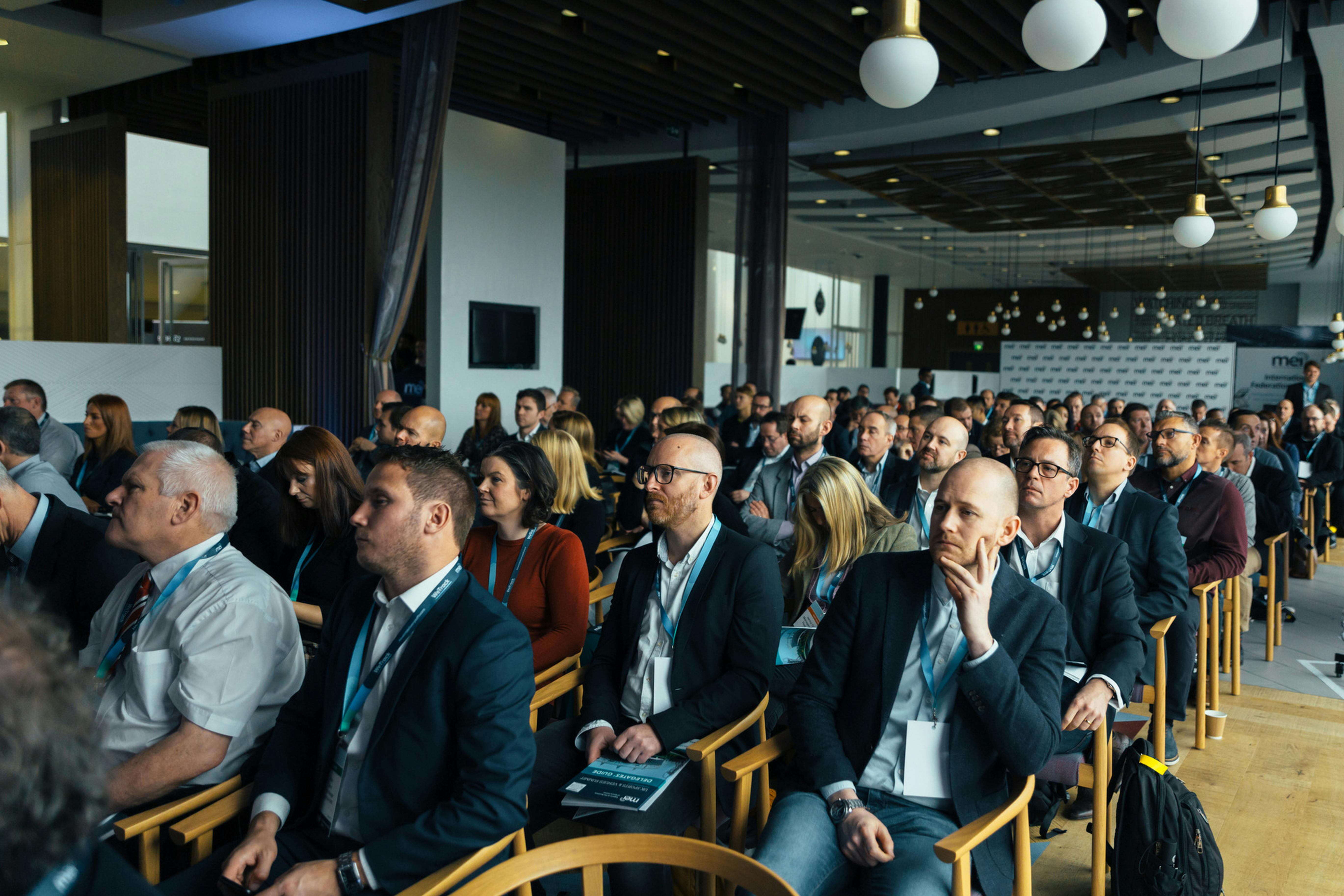 A stock image of people attending a seminar